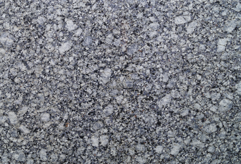 Ghiaccio Blu natural granite black, white, grey and blue tones